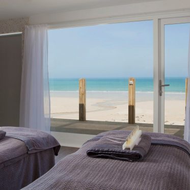 Spa treatment room with view of the beach.