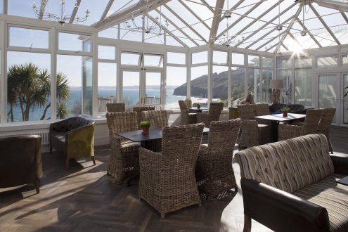 Inside of conservatory with seating.