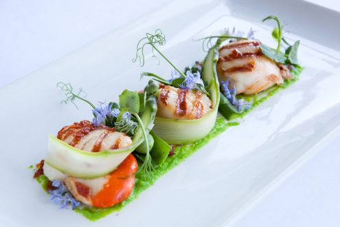 Rectangular plate with colourful food.