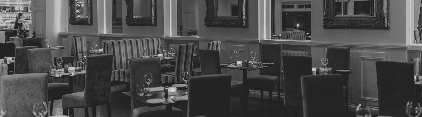 Black and white image of Sands Restaurant interior.