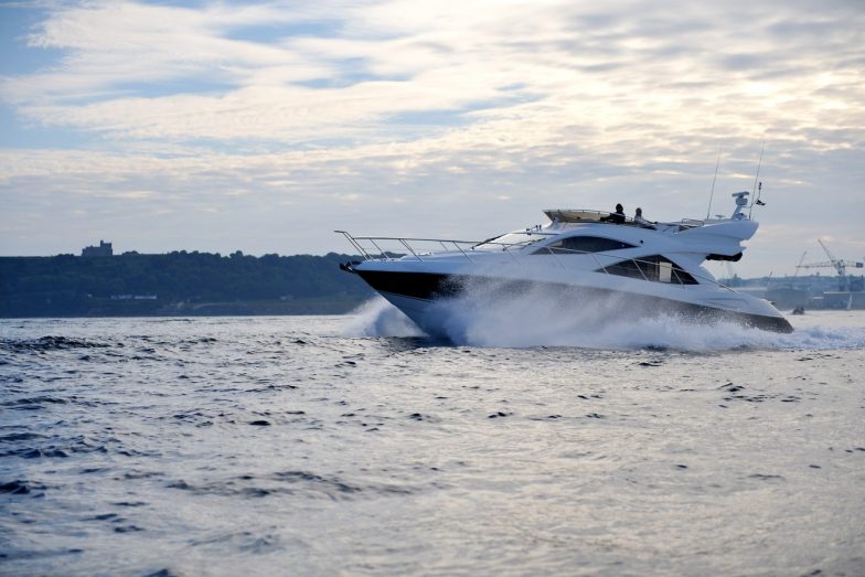 Sunseeker Yacht on water at Carbis Bay.