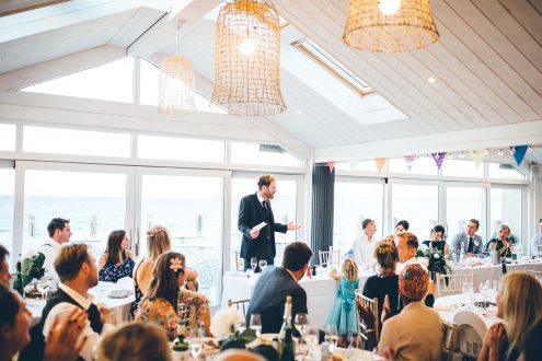 Wedding reception with view of beach.