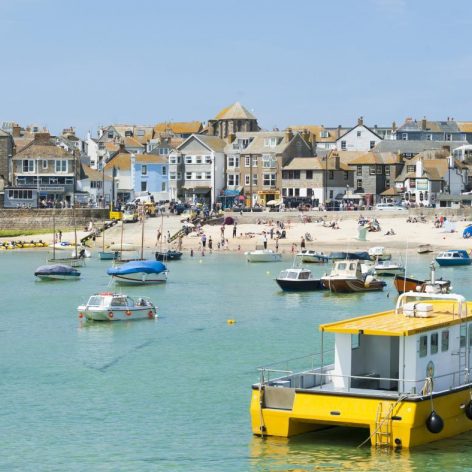 Busy St Ives harbour with boats