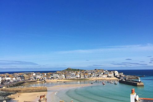 St Ives harbour with sunshine and blue sky